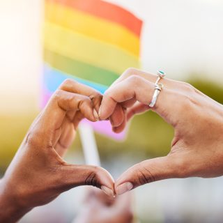 Lgbtq,,Pride,Flag,And,Hands,With,A,Heart,Sign,For